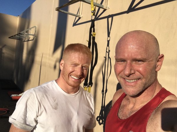 r to l: Darren Kavinoky and workout partner in their traditional Workout Selfie pic